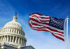 House Bulldozes Gridlock, Supercharges Border U.S. Capitol building with American flag waving.