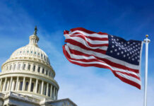 House Bulldozes Gridlock, Supercharges Border U.S. Capitol building with American flag waving.