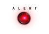 Gang Kingpin Vaporized — But By Whom? A red alert button with the word 'ALERT' above it