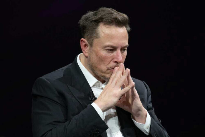 shutterstock_23188003131 Elon Musk in suit thinking.