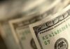 Double Facebook User Payday, Harsh Cutoff Close-up of a stack of hundred dollar bills