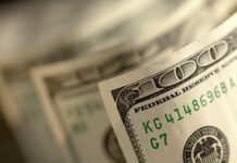 Double Facebook User Payday, Harsh Cutoff Close-up of a stack of hundred dollar bills