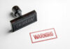Border Pipeline Revealed – Communist Infiltration? Rubber stamp with warning text imprint