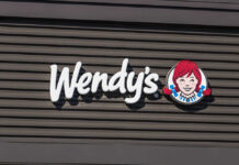 Wendy’s Rolls Dice On New Flavor Wendy's restaurant sign featuring the brand logo