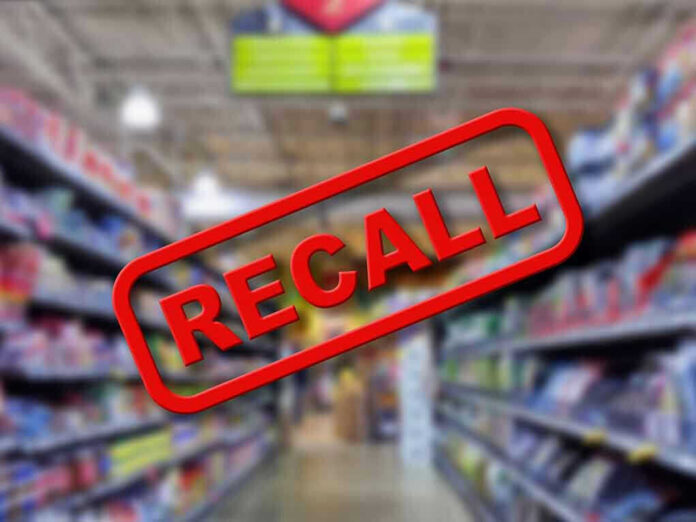 Blurred store aisle with RECALL stamp overlay.
