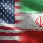 Flags of the United States and Iran blended together with a cracked texture