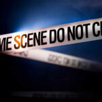 VIDEO: Summer Fun Turns Kill Zone Police tape reading 'CRIME SCENE DO NOT CROSS' in a dark setting