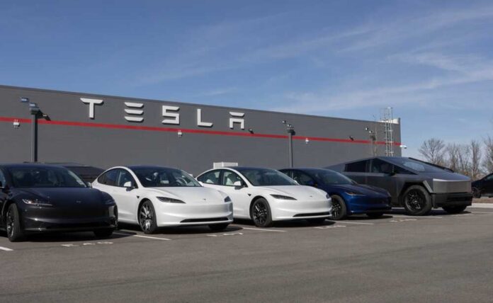 Indianapolis,-,February,28,,2025:,Tesla,Ev,Electric,Vehicle,Service A lineup of Tesla cars parked in front of a Tesla building