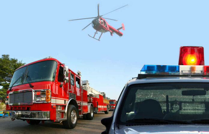 shutterstock84339196jpg Fire truck police car and helicopter at scene