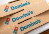 Domino’s Ditches Sharing? Stack of Domino's pizza boxes
