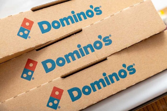 Antalya,,Turkey,-,September,10,,2021:,Domino's,Pizza,Logo,Detail Stack of Domino's pizza boxes