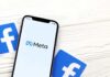 Meta’s $18B Surrender: What’s Hidden? Phone displaying Facebook app in a car