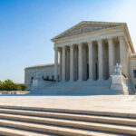 Supreme Swerve Keeps $400M Ballroom Alive United States Supreme Court building exterior, sunny day.