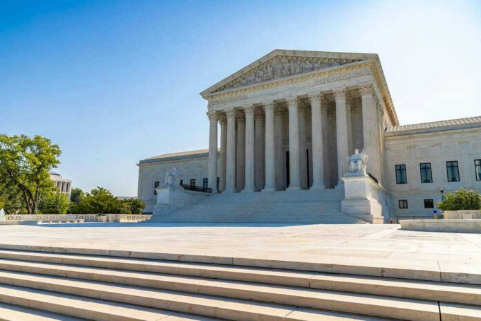 United States Supreme Court building exterior, sunny day.