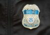 ICE Blitz Surges — See What’s Driving It Close-up of an ICE officer badge on a black jacket