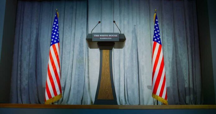 Tribune,For,Politician,,Congressman,Or,Us,Minister,Political,Speech,In Press podium with the White House sign and an American flag in the background