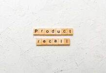 Deadly Brake Flaw Triggers Massive Recall Wooden letter tiles forming words on a white textured surface