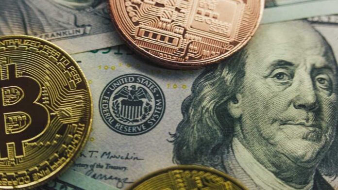 Golden,Bitcoin,Coins,And,Hundred,Dollar,Bills,With,Benjamin,Franklin Close-up of a Bitcoin and other coins on a US dollar bill
