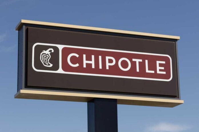 Anderson,-,March,18,,2025:,Chipotle,Mexican,Grill,Restaurant.,Chipotle FDA logo displayed on a smartphone with an American flag background