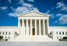 Supreme Court Gives Trump Greenlight Supreme Court building with grand columns and steps under a blue sky