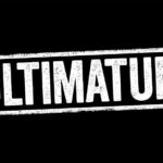 DOJ Ultimatum: Report Illegals Or Lose THIS! The word ULTIMATUM in bold white letters on a black background
