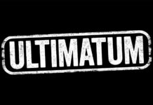 DOJ Ultimatum: Report Illegals Or Lose THIS! The word ULTIMATUM in bold white letters on a black background