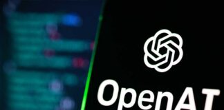 Smartphone displaying OpenAI logo on a keyboard