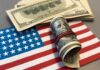 Shock Pledge: Cash Only If GOP Wins A roll of hundred dollar bills placed on an American flag
