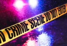 HORROR: Teen Killed Mid-Drive Crime scene tape with flashing lights in background.