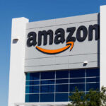 Amazon’s Quiet Chop Sparks Bigger Fears Exterior view of an Amazon building with a prominent logo