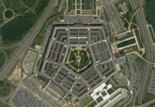Aerial view of the Pentagon building surrounded by roads and parking lots