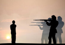 Pentagon Greenlights Firing Squad – Shock Move Silhouette of soldiers firing squadding a person