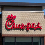 CEO Draws Line: No AI At Window Chick-fil-A restaurant sign on a brick building