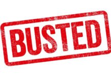 Red Busted stamp on white background