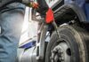 Red Diesel Goes Legal – For Now Person fueling a large truck with a gas pump
