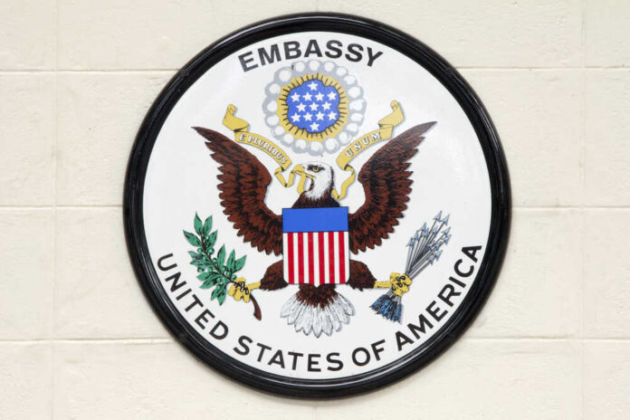 Bangkok,,Thailand-september,22nd,2014.,The,Us,Embassy,Sign.,The,Embassy Seal of the United States Embassy featuring an eagle and national colors