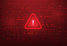 Warning triangle icon on red digital background