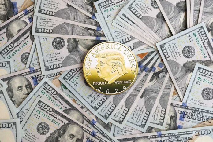 Kyiv,,Ukraine,-,December,13,,2025,Trump,Gold,Coin,On Gold commemorative coin on spread of US hundred-dollar bills
