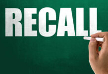 Battery Fire Risk Triggers Nationwide Recall Hand holding chalk writing on green chalkboard