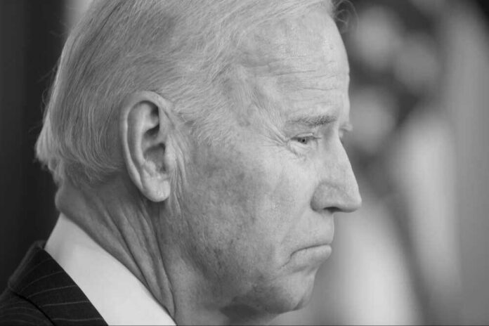 Joe Biden in profile, black-and-white close-up portrait